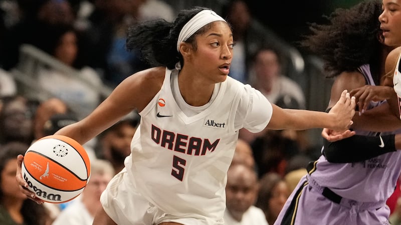 Atlanta Dream forward Angel Reese (5) dribbles the ball during Game 4 of the WNBA basketball...