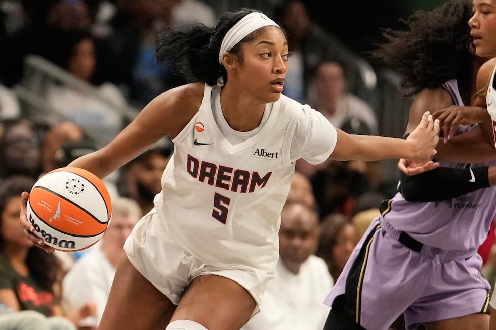 Atlanta Dream forward Angel Reese (5) dribbles the ball during Game 4 of the WNBA basketball...