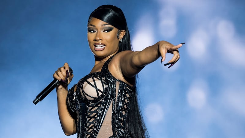 FILE - Megan Thee Stallion performs at the Reading Music Festival, England, Aug. 26 2022. Hip...