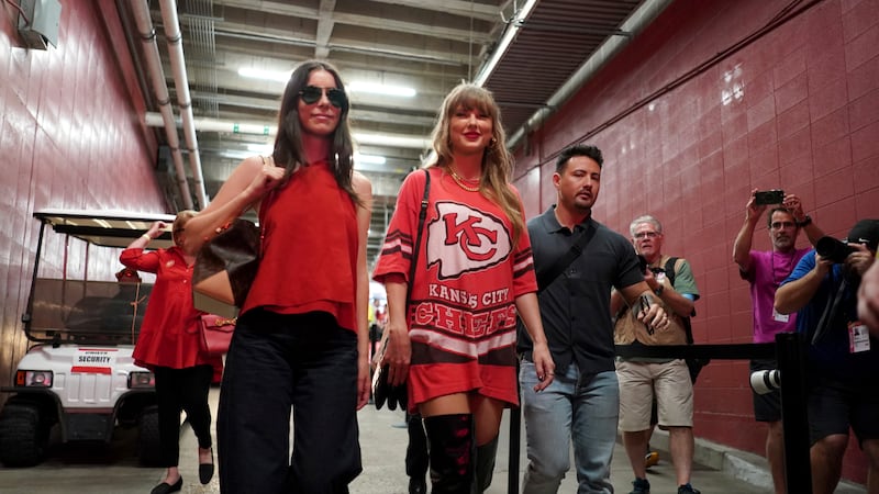 Taylor Swift arrives before the start of an NFL football game between the Kansas City Chiefs...