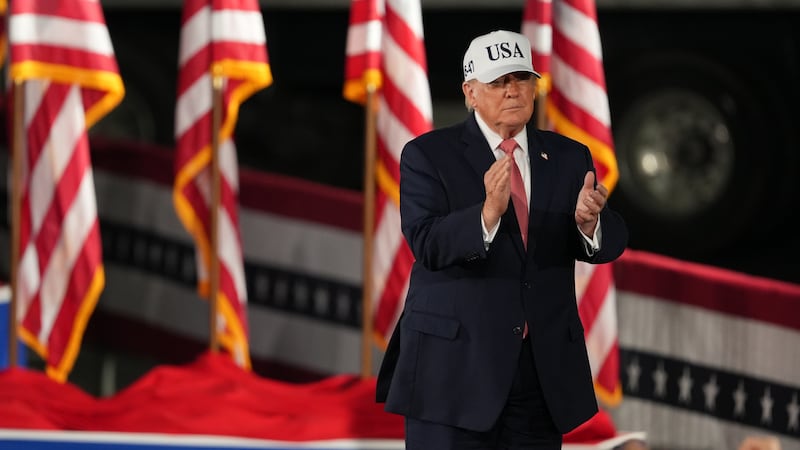 President Donald Trump arrives at a campaign rally at Pitt–Greenville Airport, Tuesday, Oct....