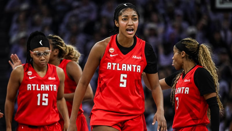 Atlanta Dream forward Angel Reese (5) reacts during the first half of Game 2 of the WNBA...