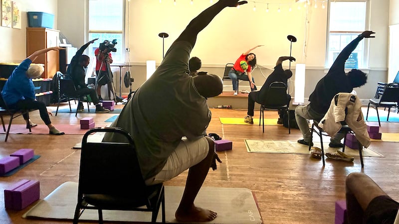 a free program providing yoga to those experiencing homelessness