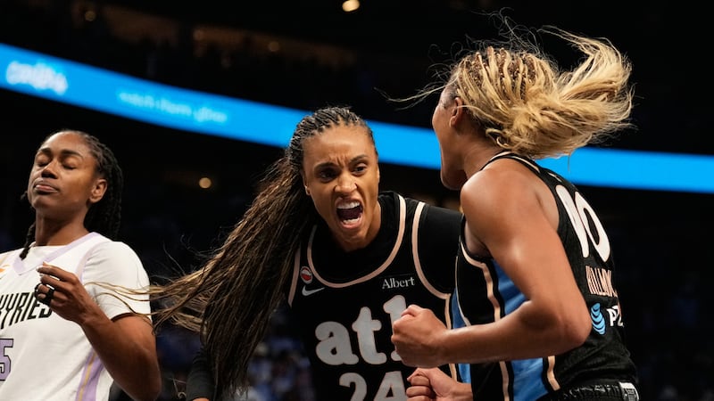 Atlanta Dream forward DeWanna Bonner (24) and Atlanta Dream guard Rhyne Howard (10) react...