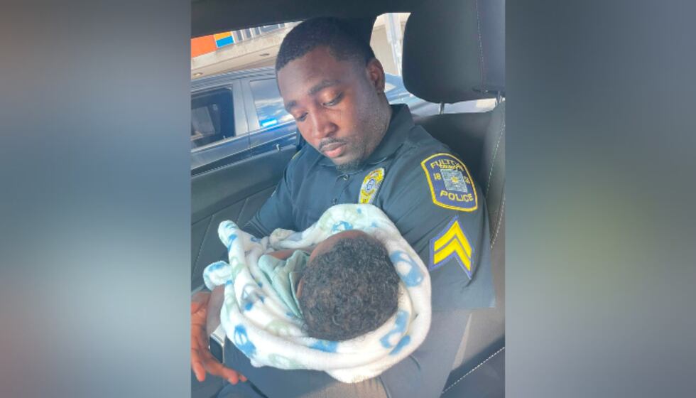 Fulton County police officer and rescued infant