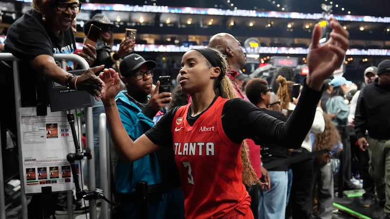 Atlanta Dream's Jordin Canada walks of the court after the Dream won Game 6 of the WNBA...