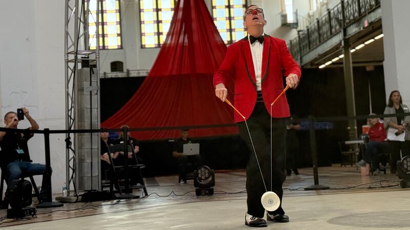 A performer from the Circus Arts Conservatory performing in a dress rehearsal at the...