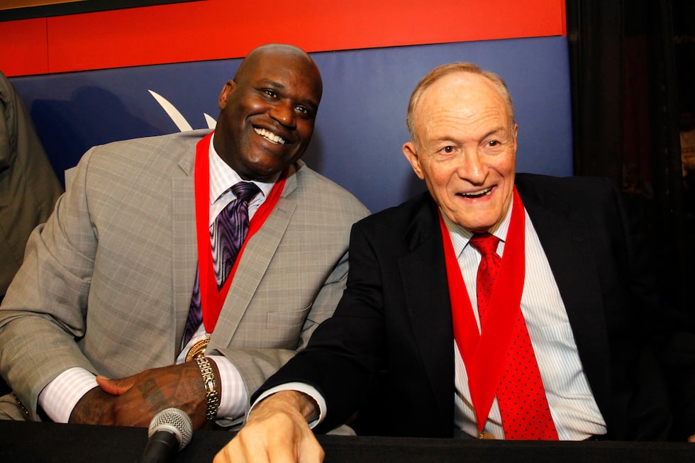 Former Louisiana State player Shaquille O'Neal, left, and former LSU basketball coach Dale...
