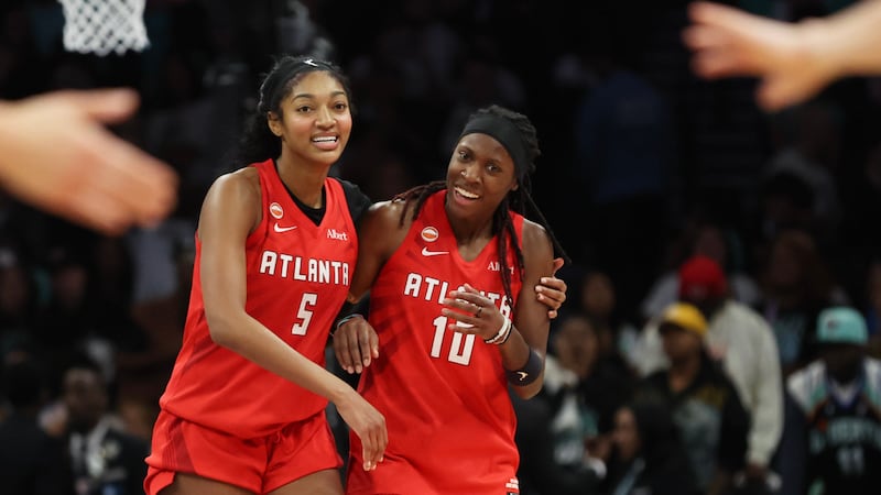 Hot wings, cold drinks and plenty of televisions are drawing fans to Atlanta sports bars to...