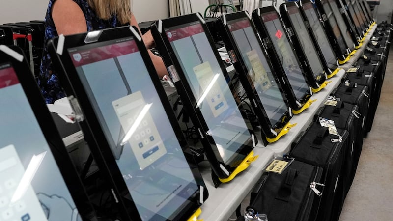 More than 40 trained bilingual volunteers are fanning out across polling sites in Gwinnett,...